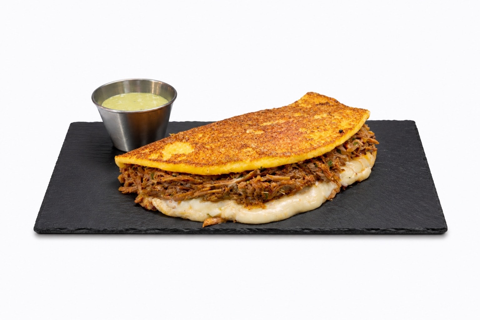 Cachapa con carne mechada de Fogón Criollo