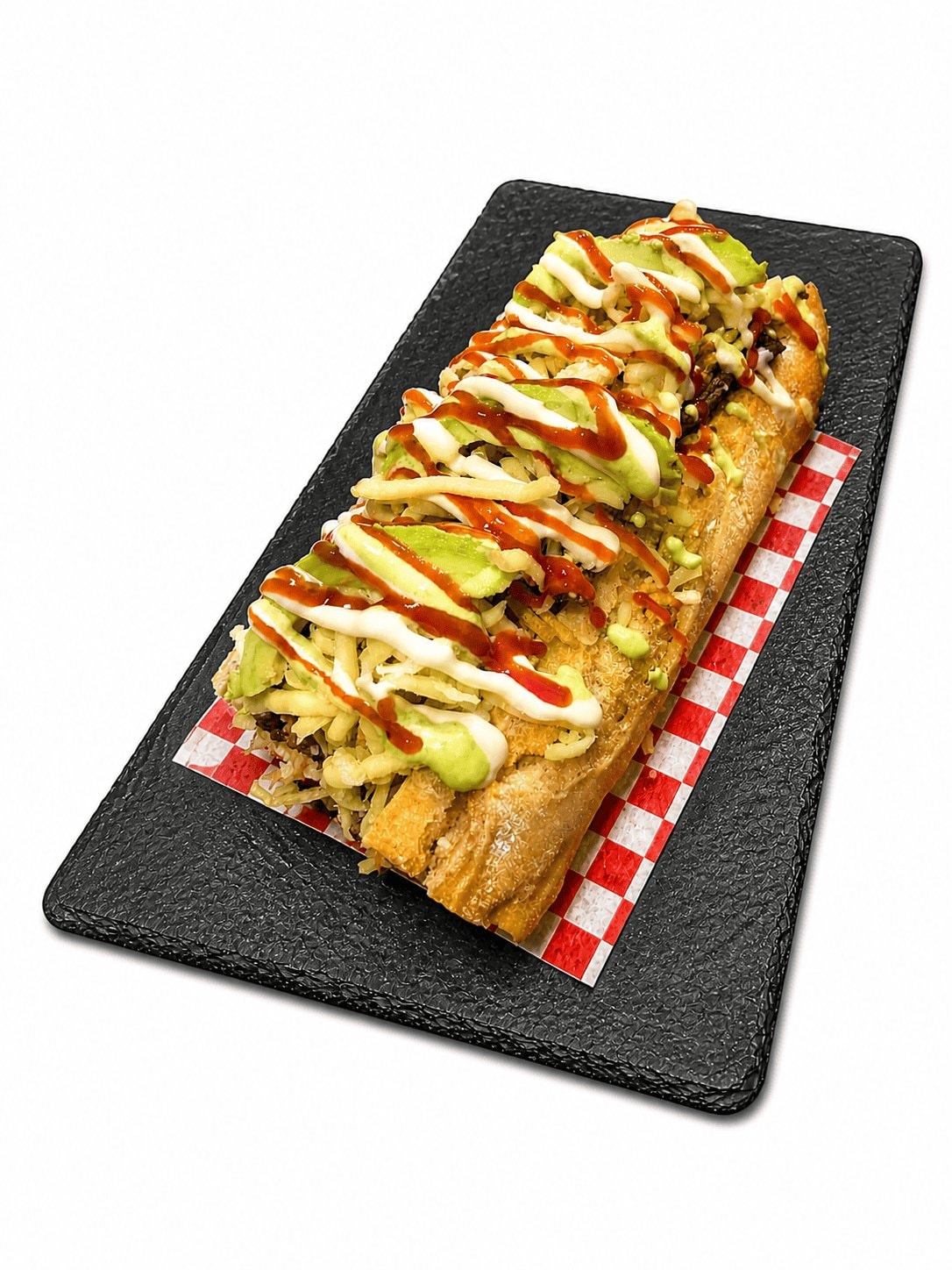Pepito Fogón Brutal — pan especial con ternera, patatas, queso Édam y guasacaca